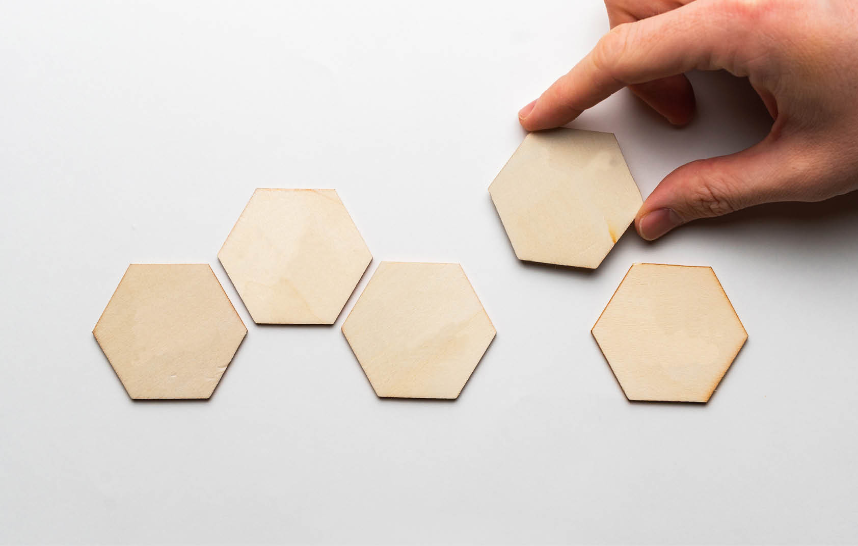 The concept of creating customer service and support from icons on wooden blocks