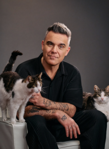 Purina Felix lanza nueva campaña de la mano de Robbie Williams, foto robbie Williams con gato