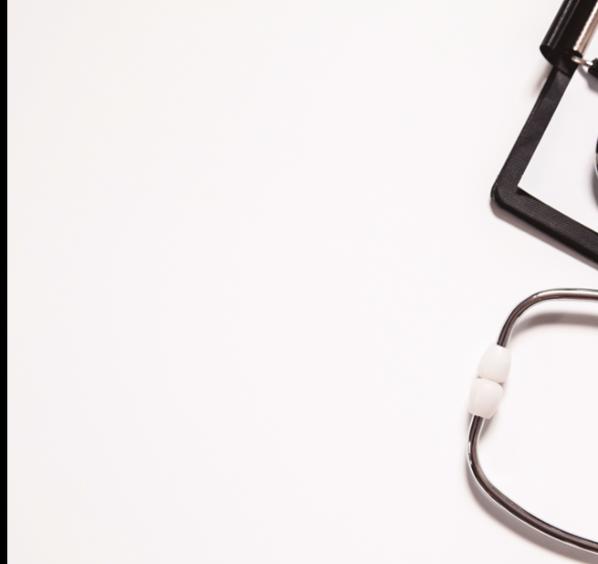 Stethoscope and blank clipboard isolated on white  Stethoscope and clipboard with blank white sheet of paper and copy space  Medical concept