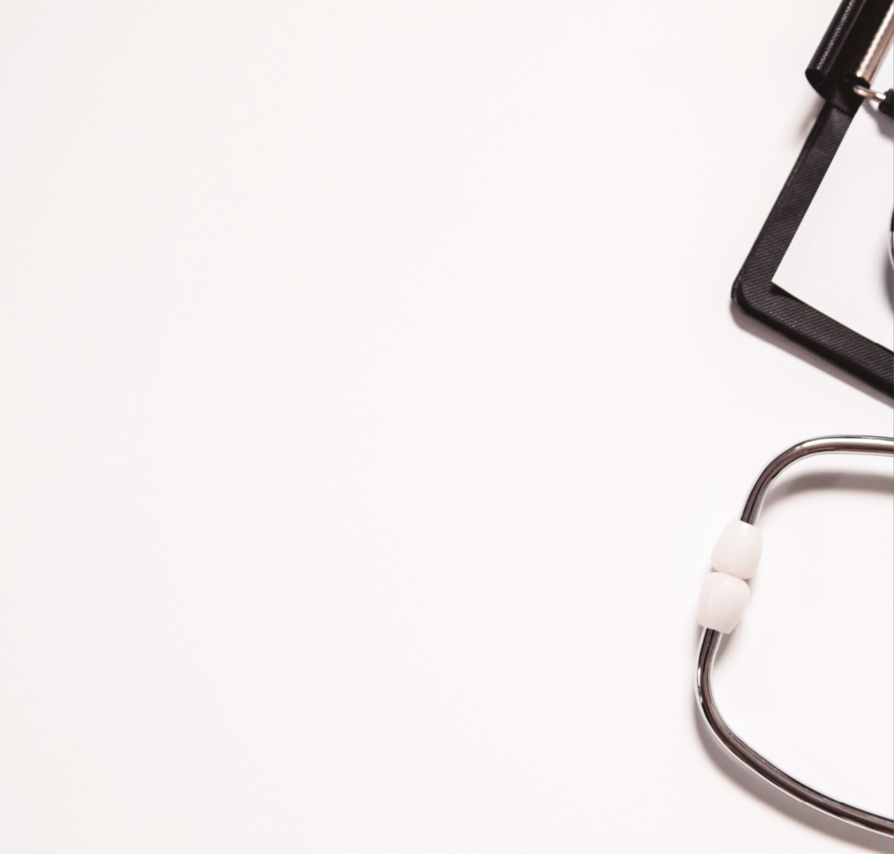 Stethoscope and blank clipboard isolated on white  Stethoscope and clipboard with blank white sheet of paper and copy space  Medical concept