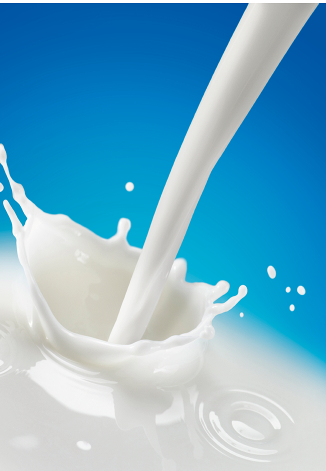 A Splash of Milk over Blue Background