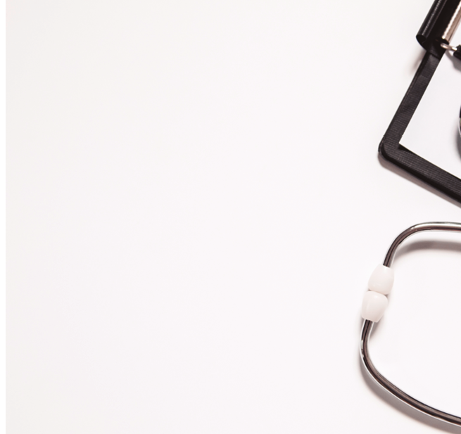 Stethoscope and blank clipboard isolated on white  Stethoscope and clipboard with blank white sheet of paper and copy space  Medical concept