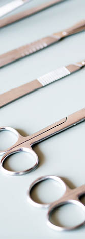 Closeup of surgery knives set isolated