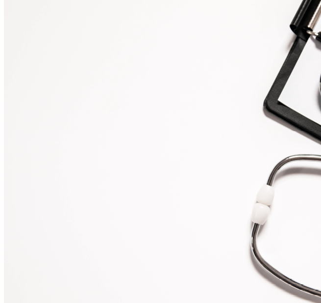 Stethoscope and blank clipboard isolated on white  Stethoscope and clipboard with blank white sheet of paper and copy space  Medical concept