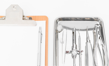 Dental tools  equipment and dental chart on white background 