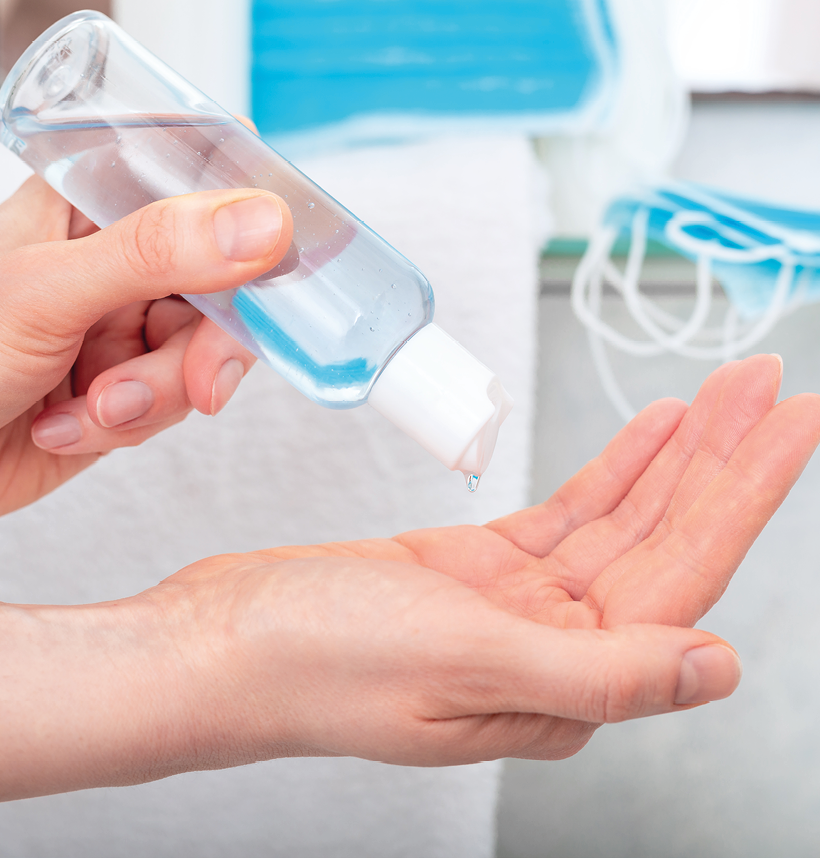 Woman use hand sanitizer  Alcohol gel for disinfection, hand hygiene