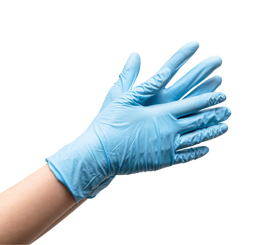 Female hands in disposable gloves on white background