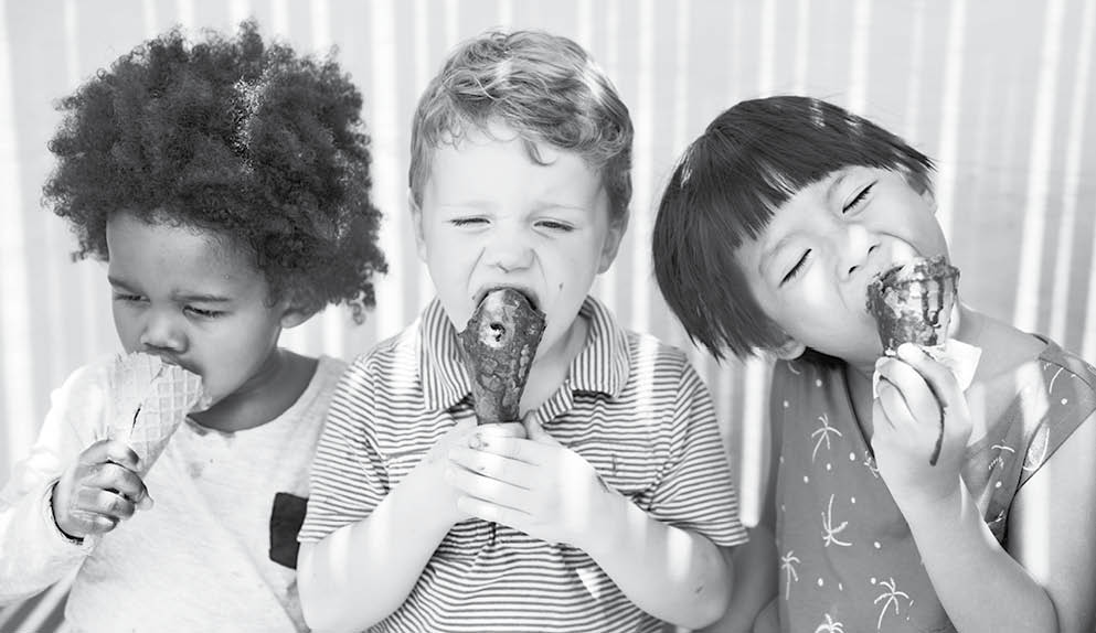 Children enjoying ice cream on a summer day